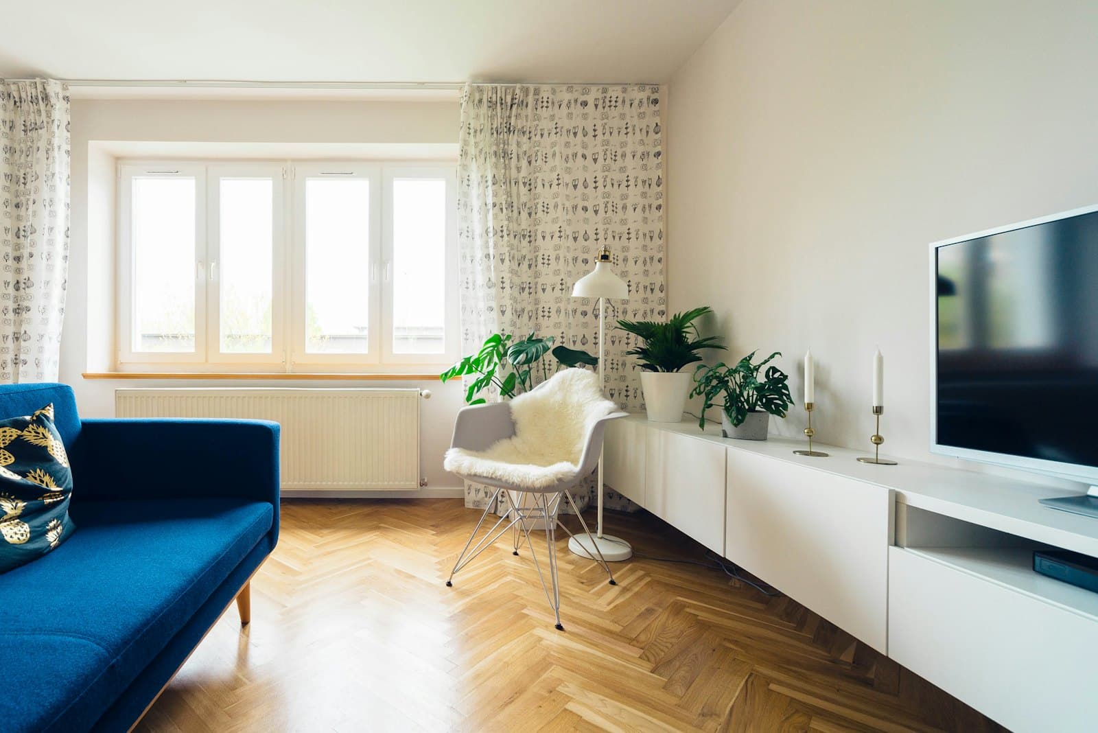 Bright living room interior with crisp white walls
