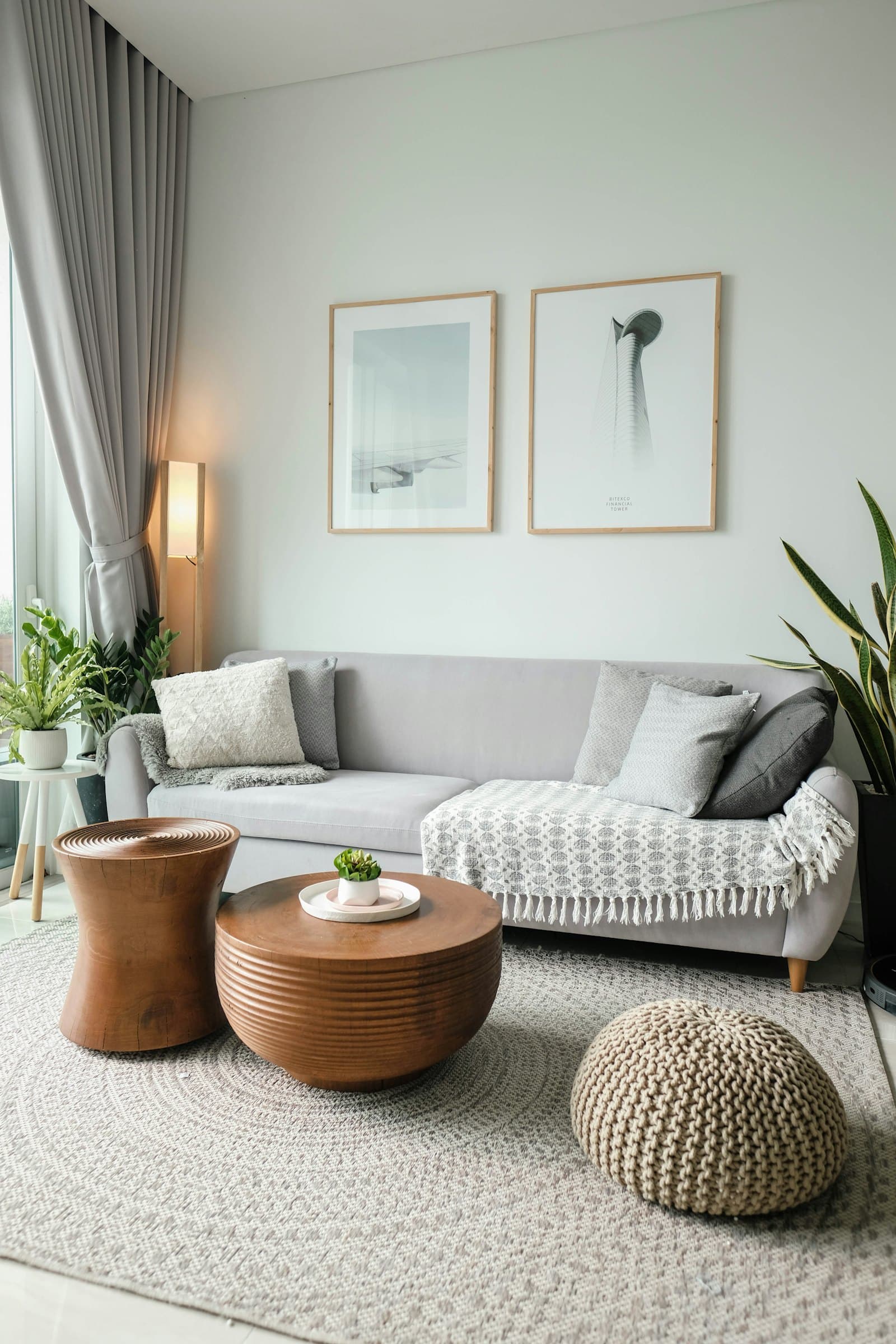Sage-toned feature wall in a styled living room